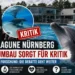 Delfinlagune Nürnberg Kritik: Delfin im Becken des Tiergarten Nürnberg vor Zuschauern, Protest gegen Delfinhaltung im Hintergrund