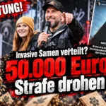 Robert Marc Lehmann und Caroh Weber bei der Anti-Zoo-Demo neben Warnhinweisen zu invasiven Samen und möglichem Bußgeld – Robert Marc Lehmann Demo.